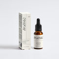 Holisté skincare bottle and box on a white background
